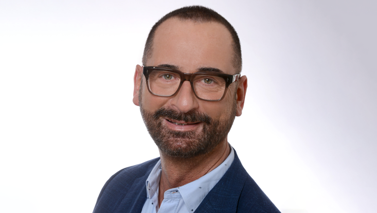 Porträt von Norbert Ritter, Mann mit Brille